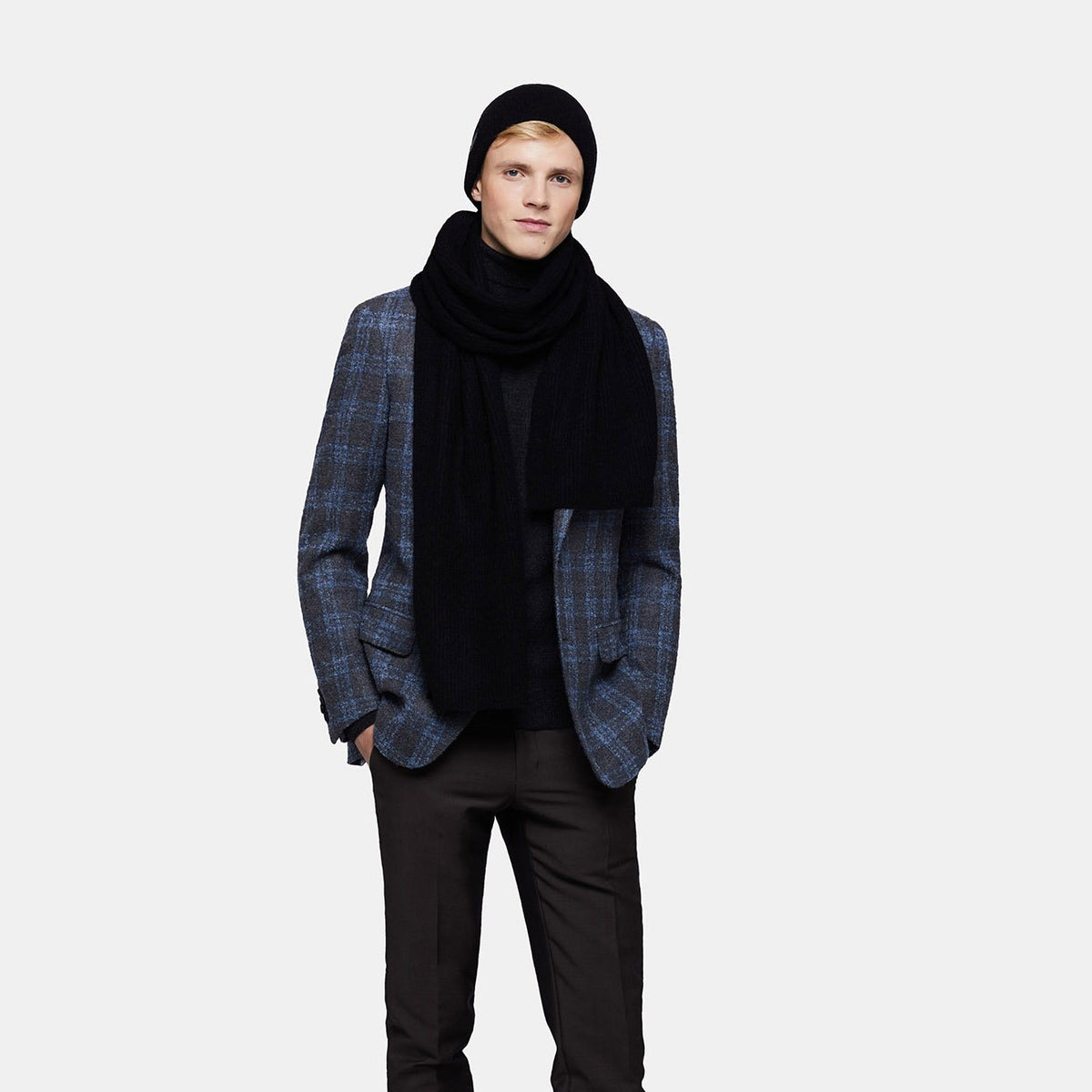 3. Men's black Alpaka Fisherman's Rib scarf and hat styled with blazer in studio
