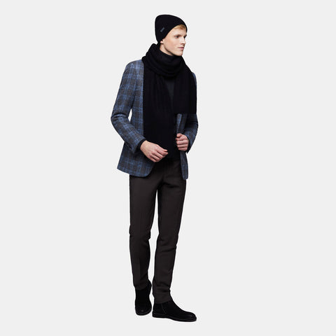 4. Men's black Alpaka Fisherman's Rib scarf and hat shown in side view with blazer