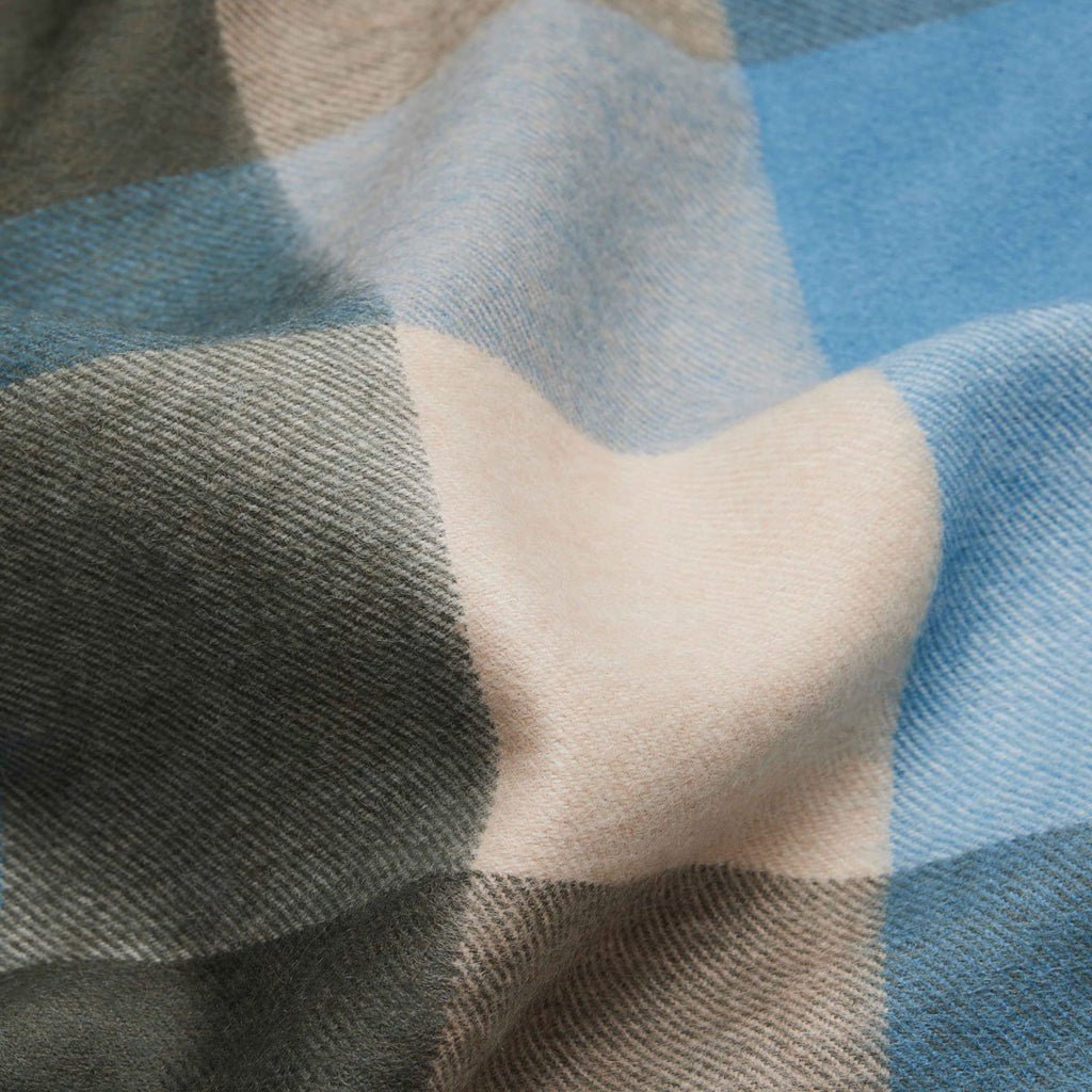 3. Close-up of blue and grey check pattern on women's baby alpaca wool scarf