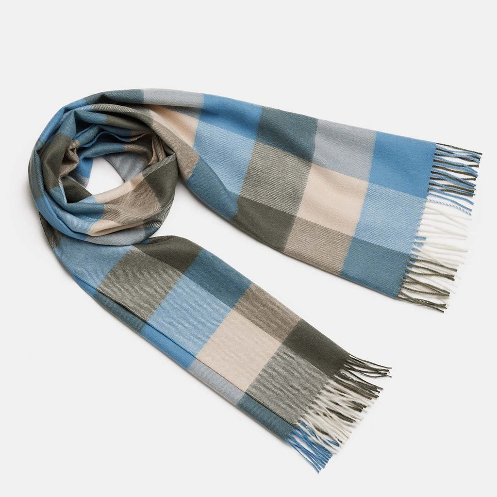 2. Women's natural baby alpaca wool check scarf in blue and grey, shown in studio setting