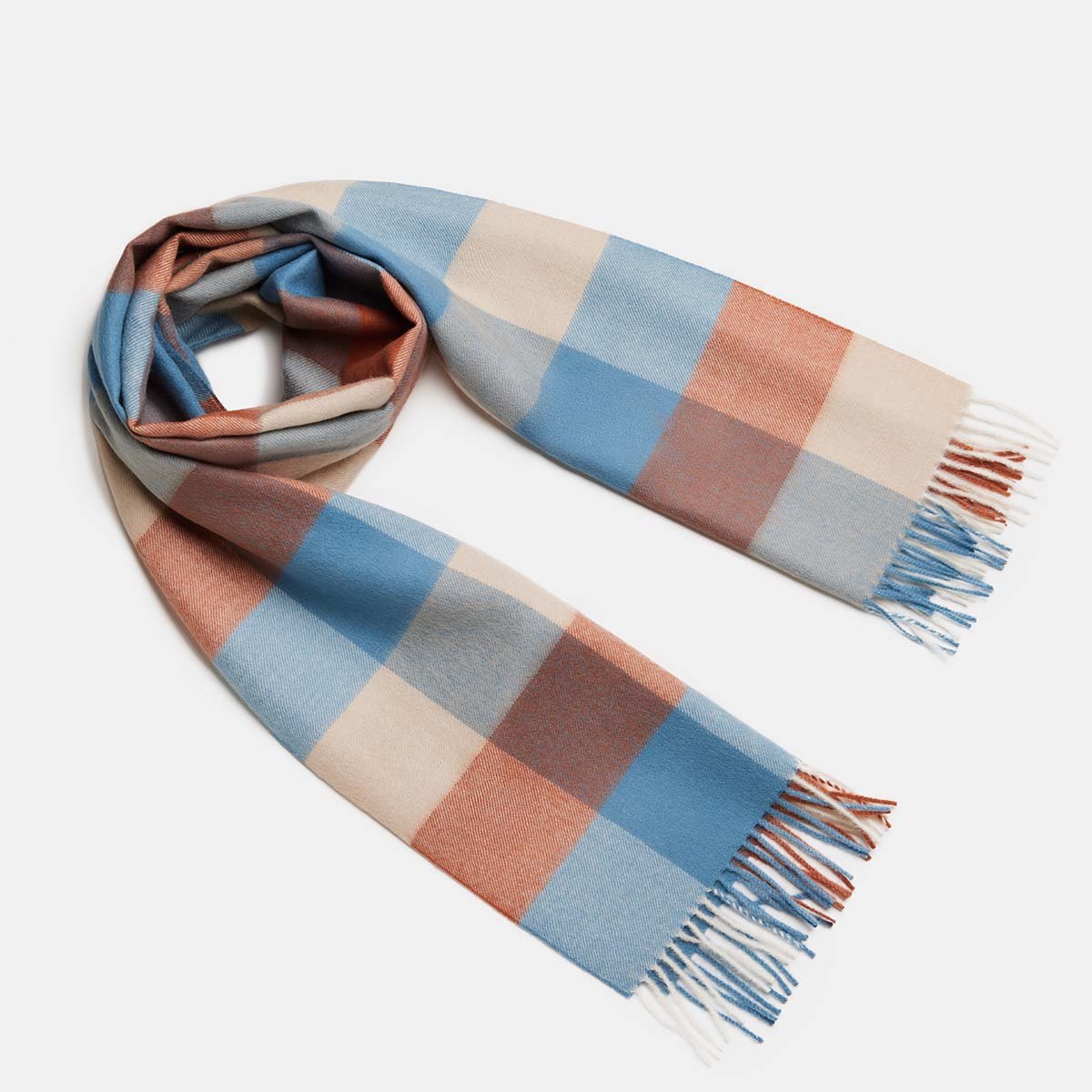 2. Women's natural baby alpaca wool check scarf in blue and orange, shown in studio setting