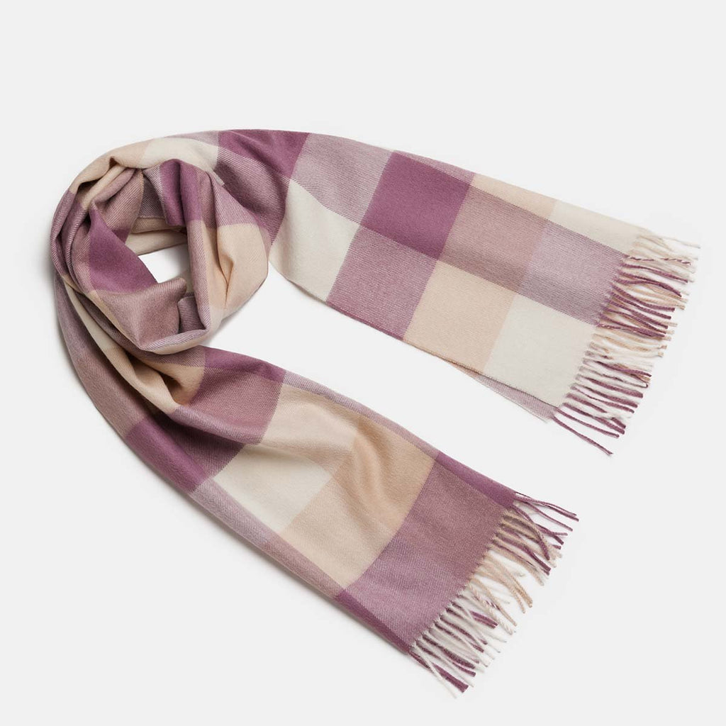 2. Women's natural baby alpaca wool check scarf in pink and white, shown in studio setting