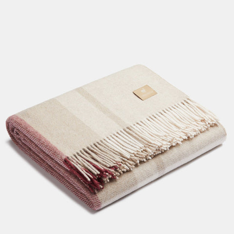 5. Folded Alpaka Natural Alpaca Wool Throw in Rosé/Beige, showing fringe and texture