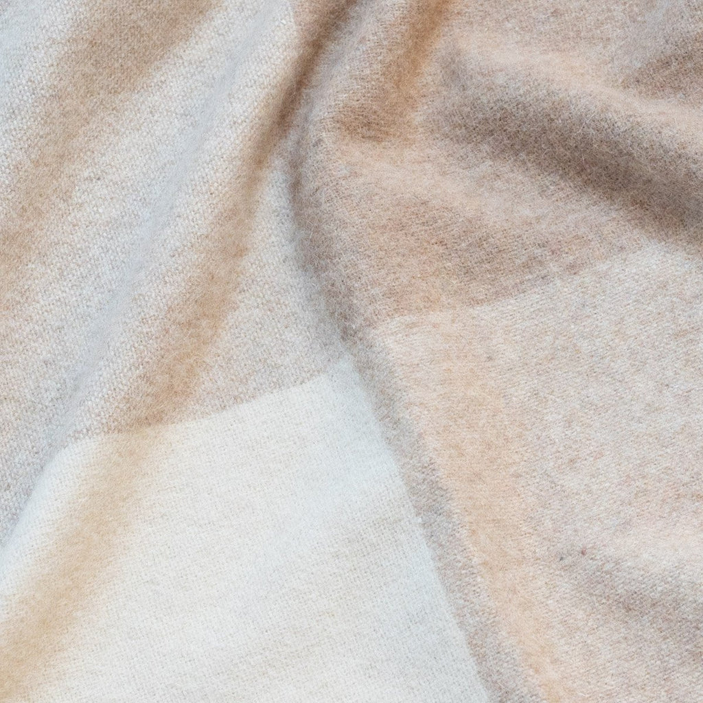 8. Close-up of beige Recycled Alpaca Wool Throw highlighting the check pattern and texture