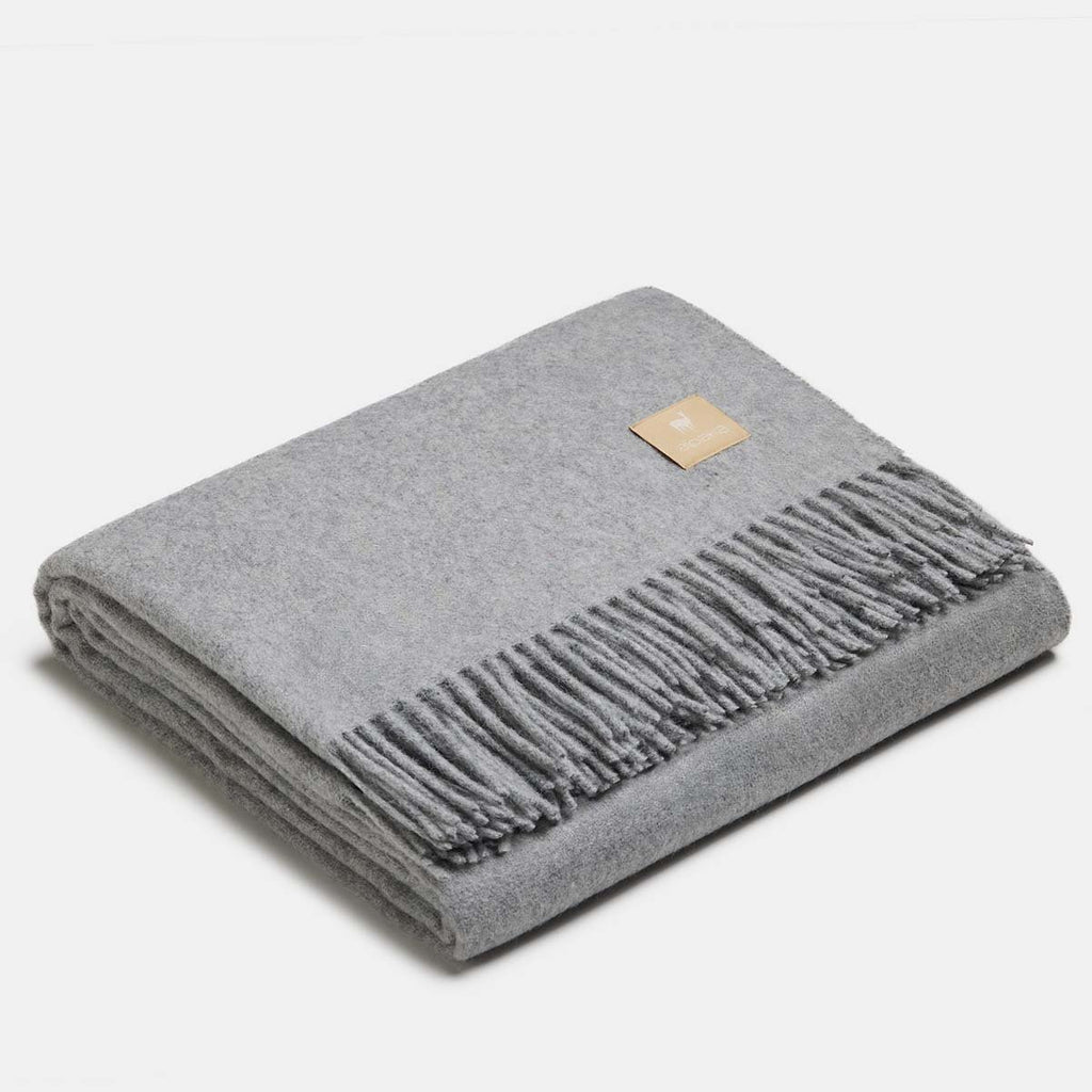 18. Dark cocoa Alpaka natural alpaca wool throw with fringe detail, folded in studio