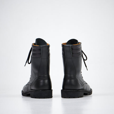 4. Back view of Aipi AIPI-1 handmade leather boots in black, highlighting craftsmanship and rubber sole