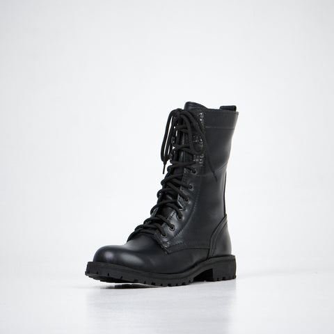 5. Aipi black handmade leather boots with stitched soles, angled front view in studio