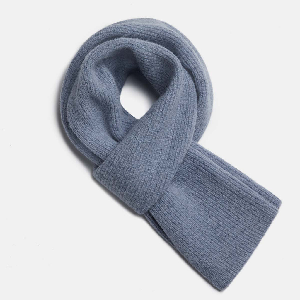 25. Flat lay of dusty blue Alpaka Fisherman's Rib scarf showing texture and design