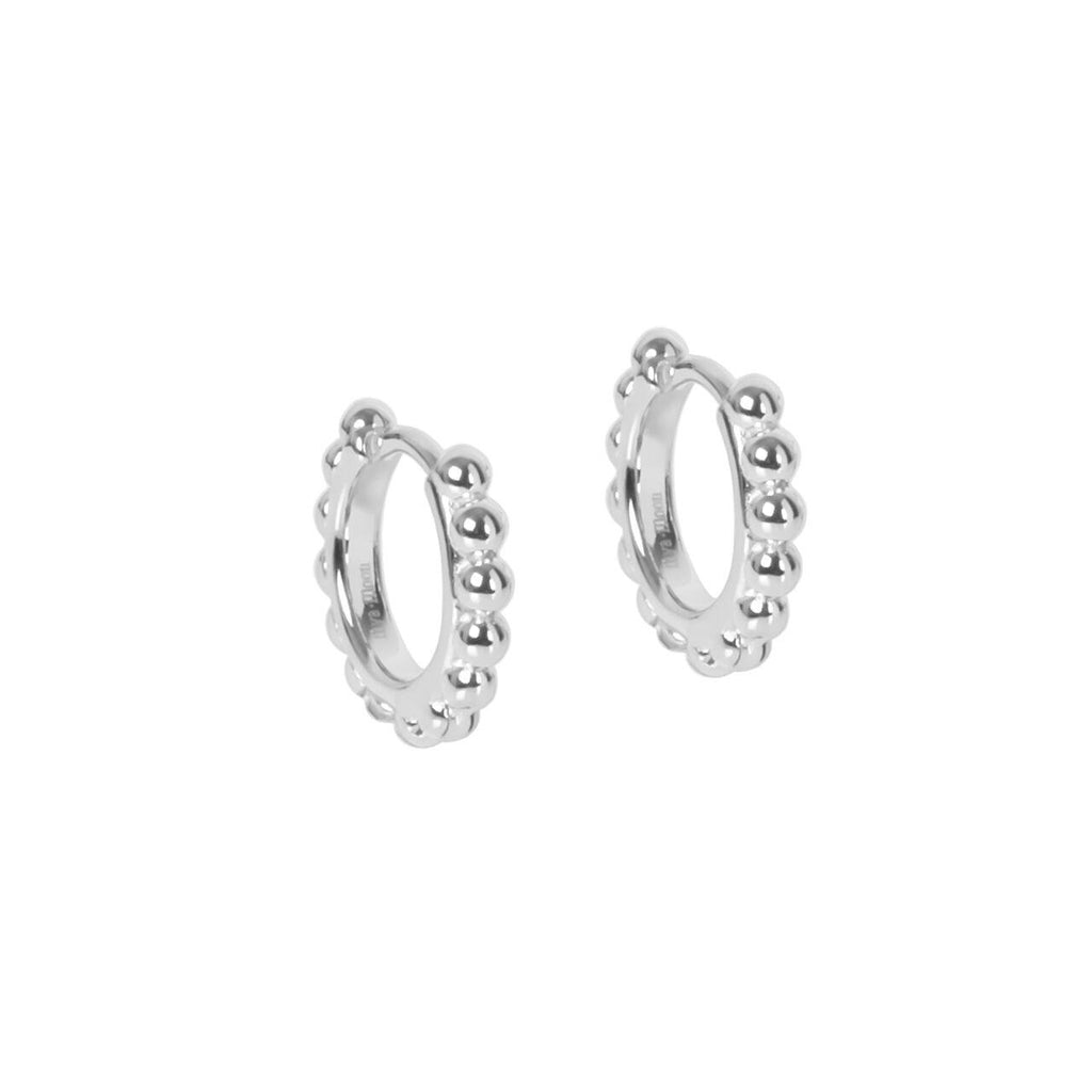 3. Studio image of MyaMoon Aria Hoops S in silver rhodium, featuring a 15 mm diameter with silver pearlstring design