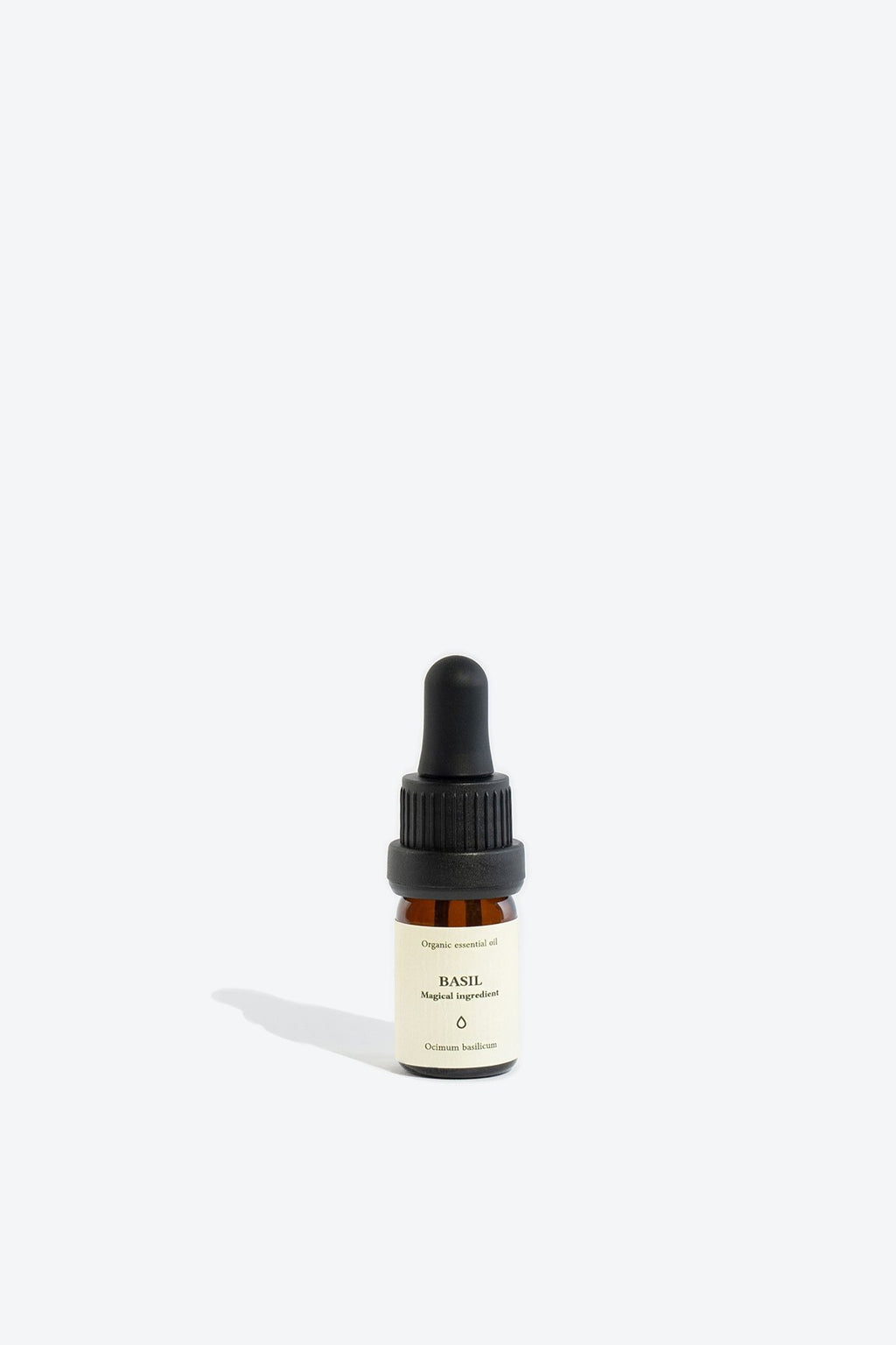 1. Smells Like Spells BASIL Essential Oil in 5 ml glass bottle with pipette, studio shot
