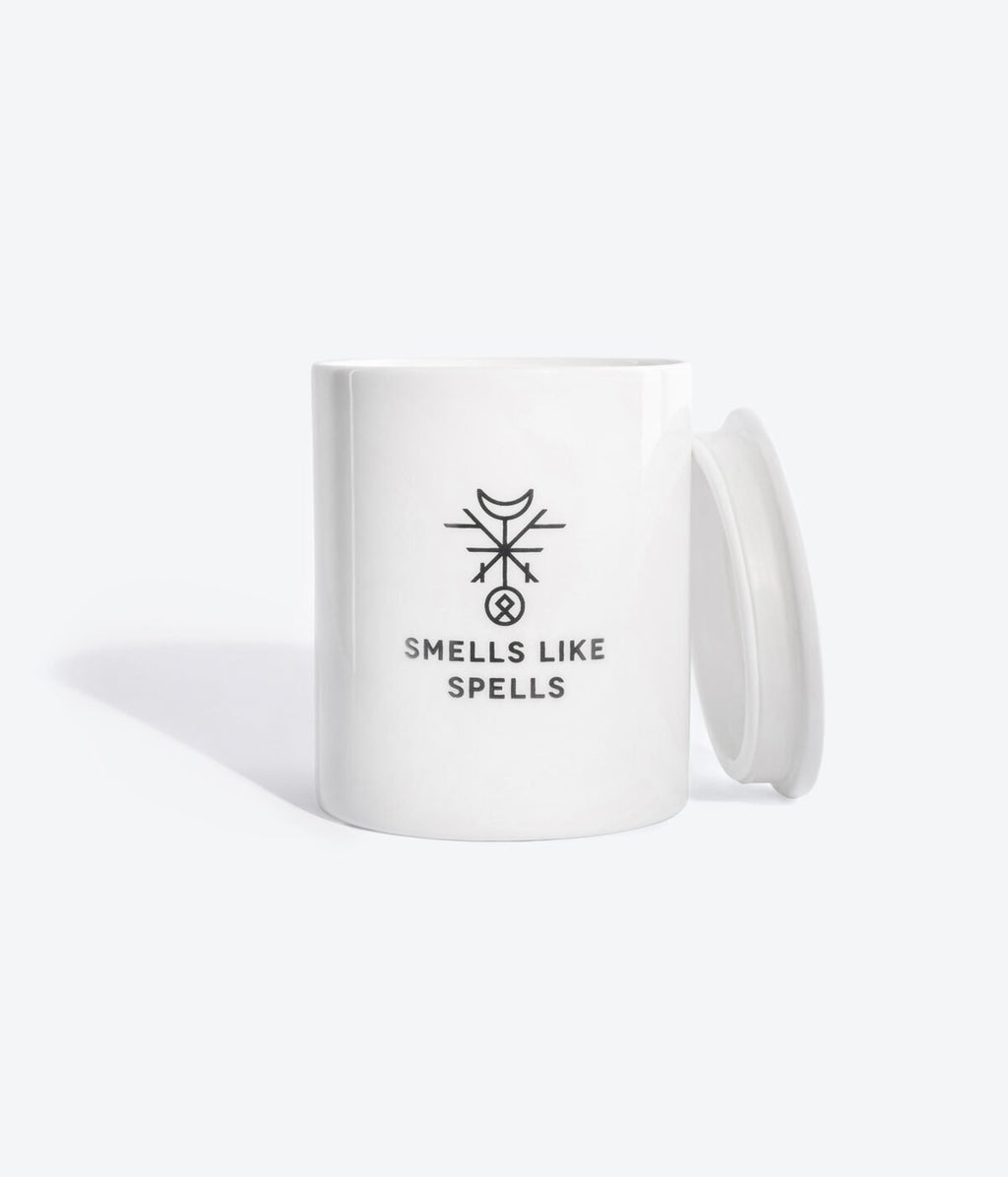 4. Smells Like Spells Scented Candle THE MOON with lid, showcasing hand-made porcelain container and logo