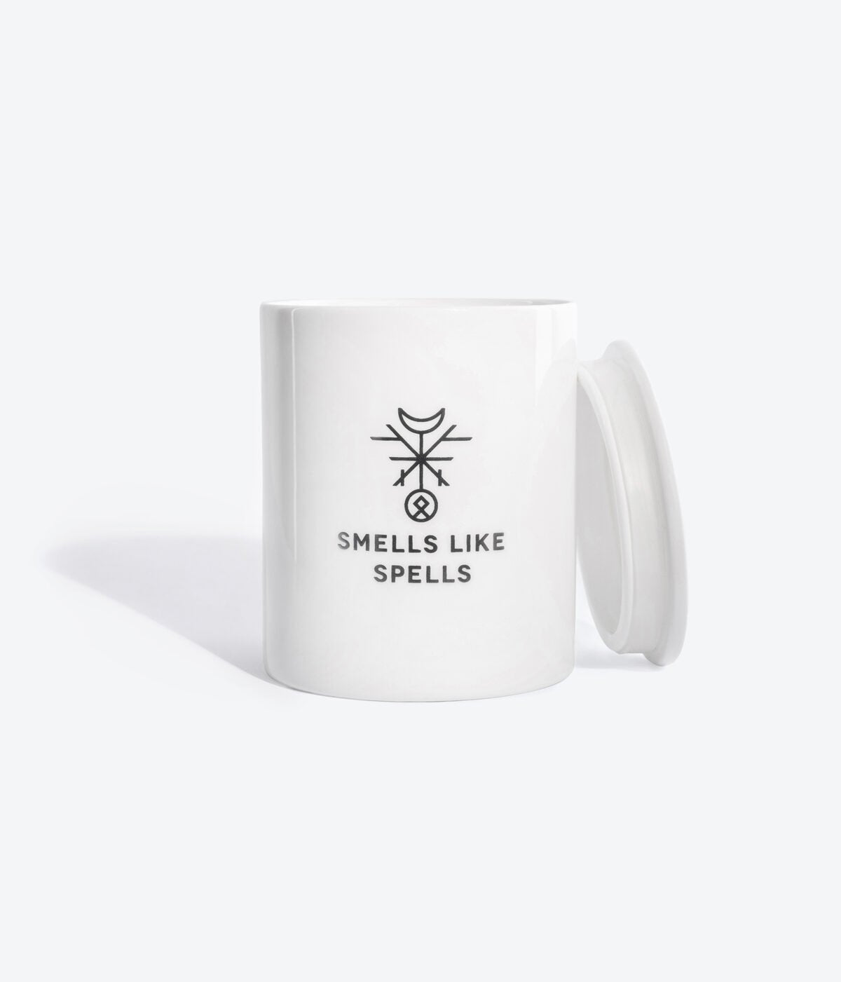 4. Smells Like Spells Scented Candle THE MOON with lid, showcasing hand-made porcelain container and logo