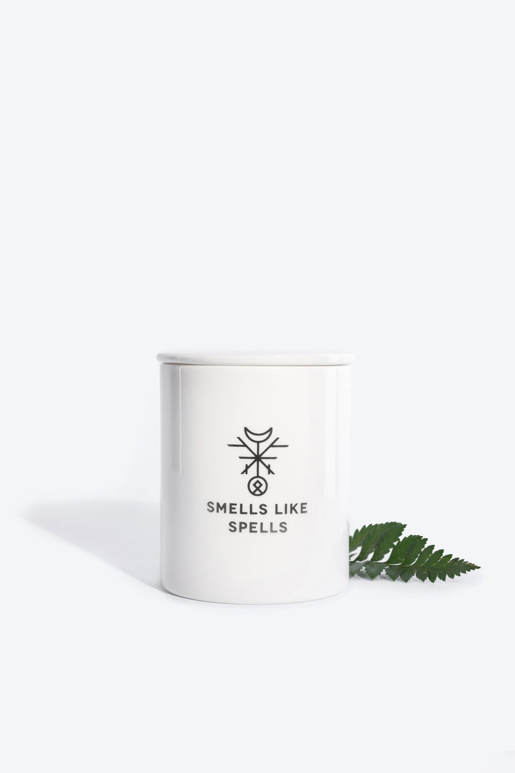 4. Smells Like Spells Scented Candle THE LOVERS with fern leaf, highlighting porcelain container