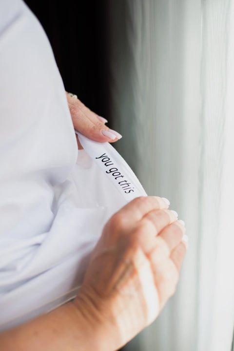 4. Close-up of hidden message 'you got this' inside the Black Giraffe Brand 'Not Today' T-shirt