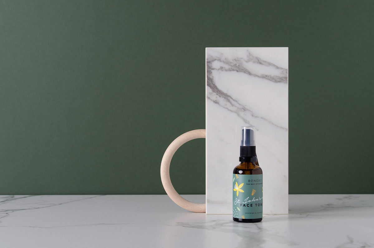 1. BONOBO St. John's-Wort Face Tonic bottle displayed against a marble and green background, highlighting natural skincare