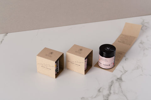 3. BONOBO face cream packaging and jar displayed on marble surface with product leaflet