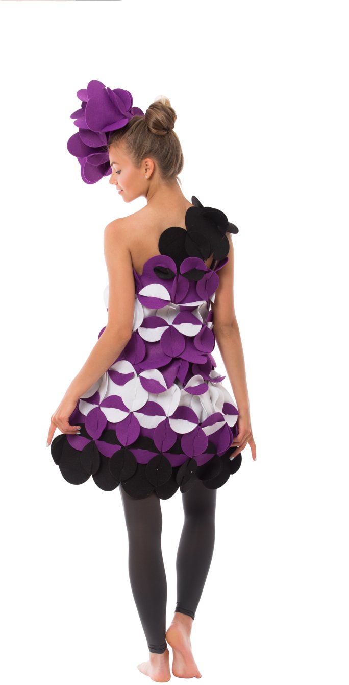 3. Woman in purple and black felt costume with floral headpiece shown from back on black background