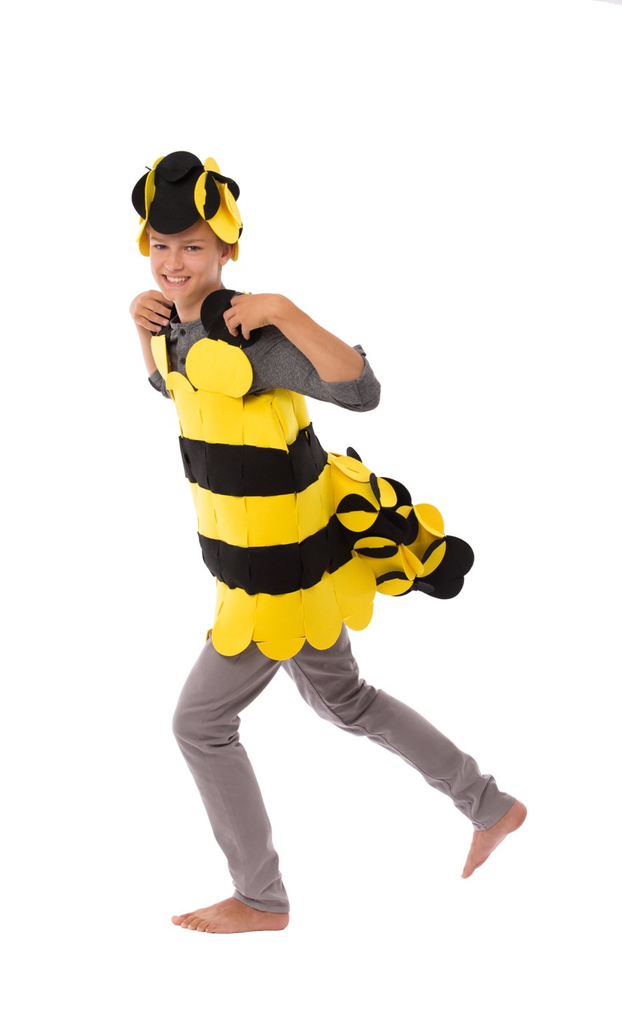 5. Child in bee costume running playfully, showcasing front view with antennae and wings against black background