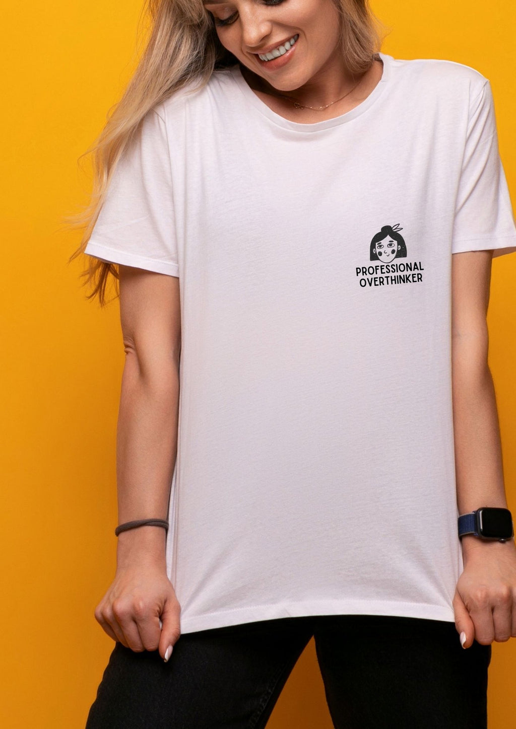 2. Women's white Professional Overthinker T-shirt by Black Giraffe Brand, oversized fit, worn by model against yellow background