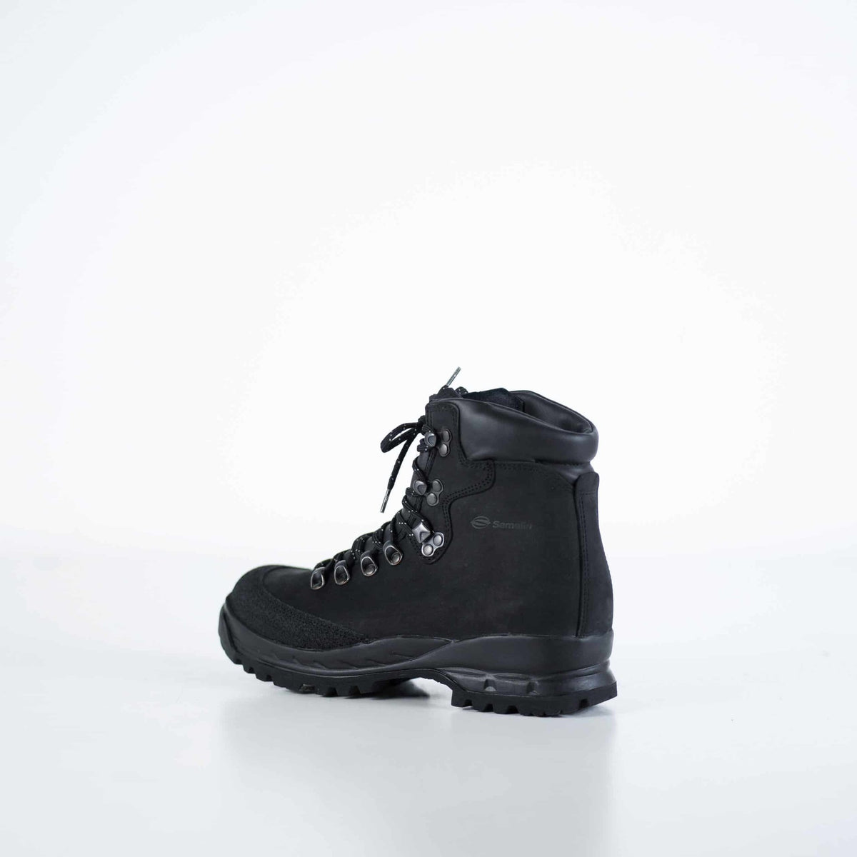 2. Side view of Samelin 553P black hiking boots, highlighting waterproof nubuck leather and Vibram sole