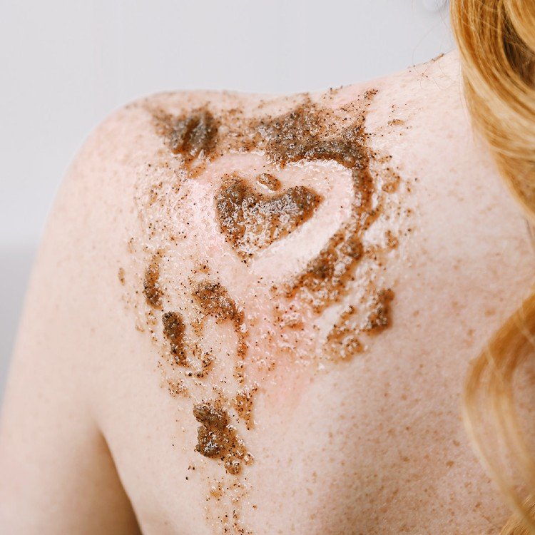 2. Vegan Fox Coffee Body Scrub applied on back, highlighting exfoliating texture