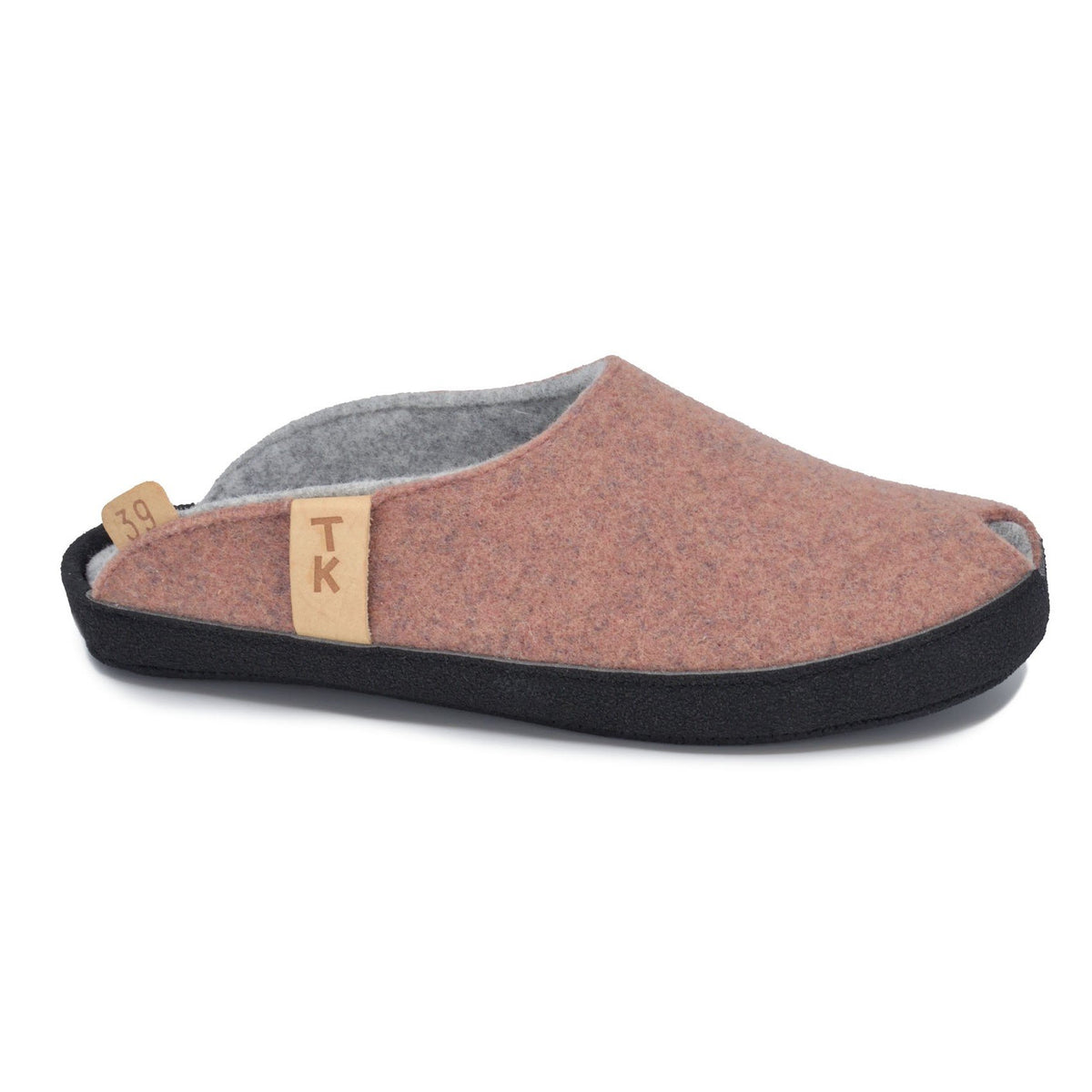 2. Side view of women's TOKU Brussels slippers in dust pink, featuring natural lambswool felt and black microfibre sole, studio shot