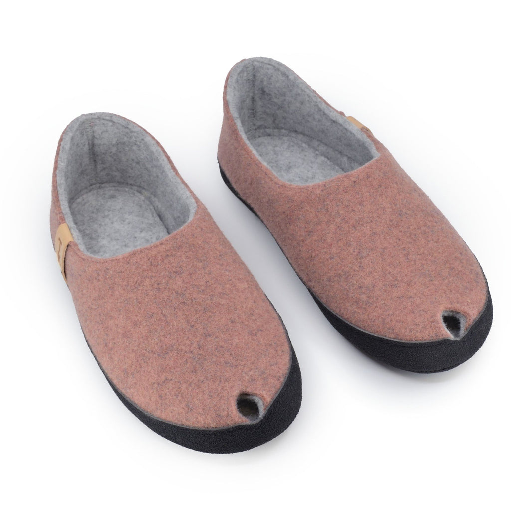 1. Women's TOKU Budapest slippers in dust pink, shown in studio setting with closed heel and toe design