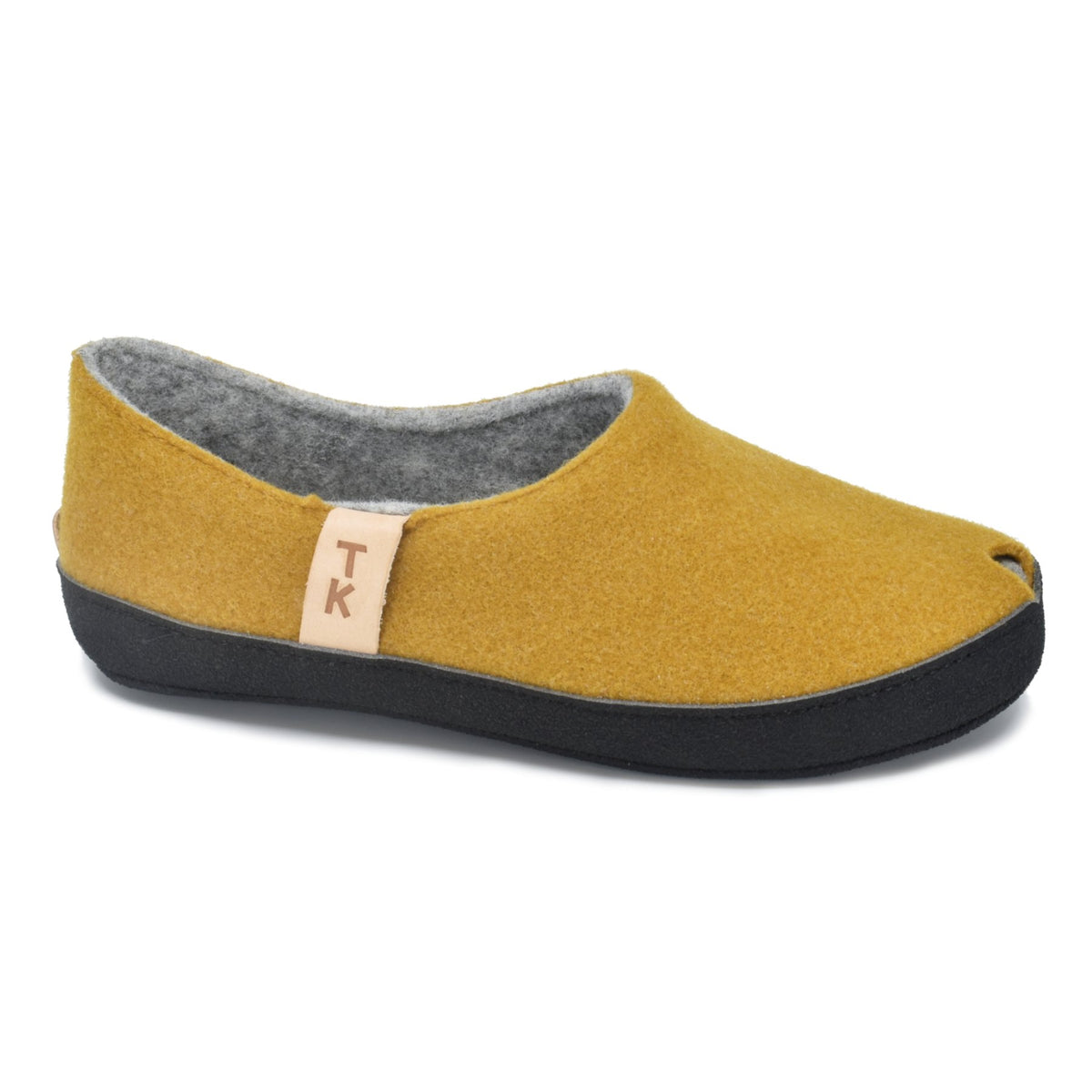 1. Studio shot of Omaking TOKU Budapest slippers in mustard yellow, featuring closed heel and toe design with peek-hole, made from natural lambswool felt