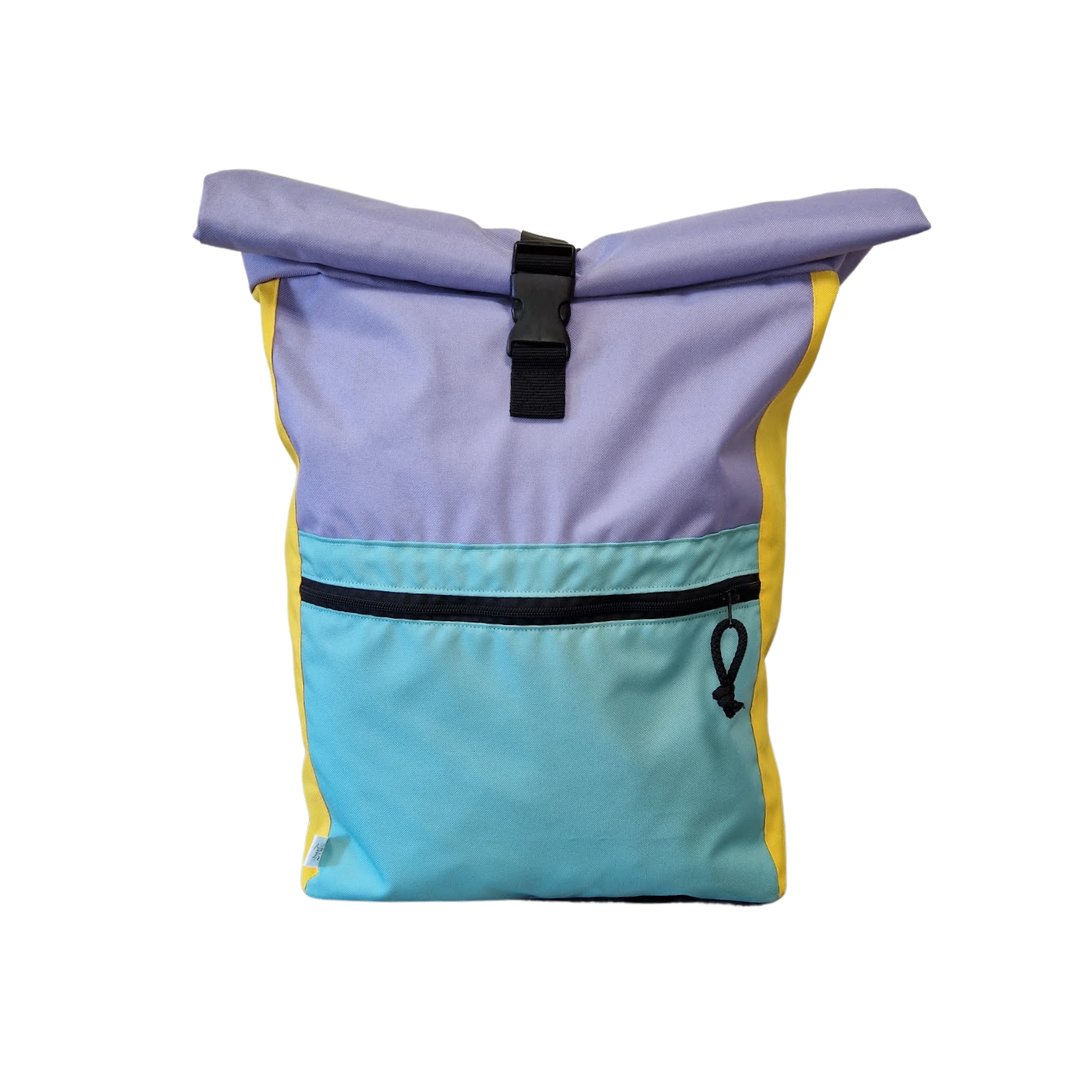 1. Drinbags CRAZY COLORS waterproof backpack in purple, blue, and yellow with roll-top closure and front zippered pocket, studio shot
