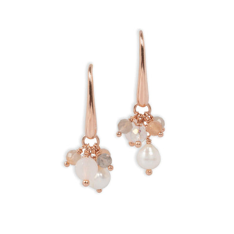 2. Studio image of MyaMoon Cherie Petite Earrings in rose gold, featuring rose quartz, freshwater pearls, and crystals