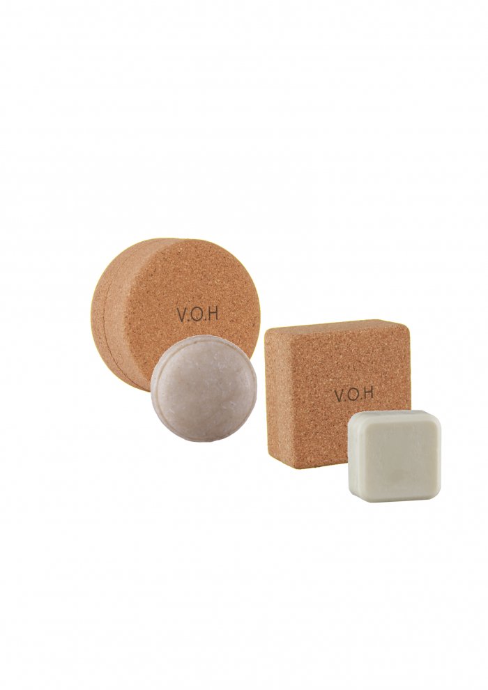 13. V.O.H solid shampoo and conditioner with corkwood cases, showcasing complete hair-care set