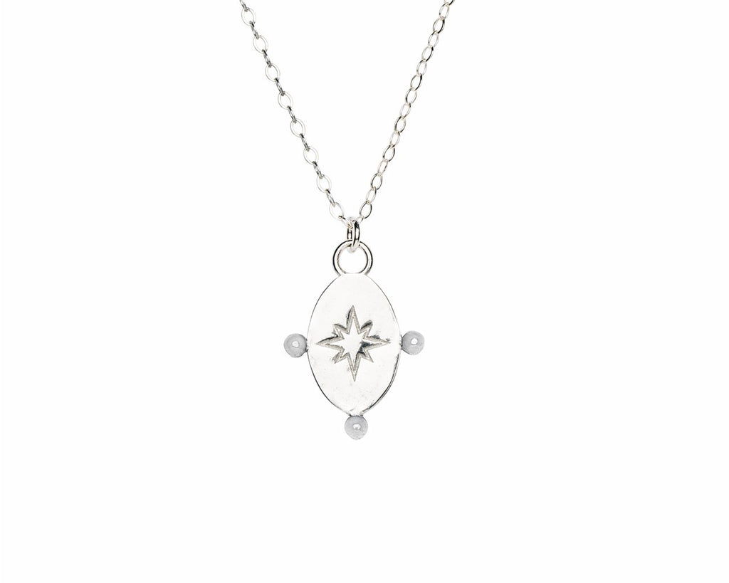 4. Close-up of Morning Star pendant in silver by New Vintage by Kriss, showing star design