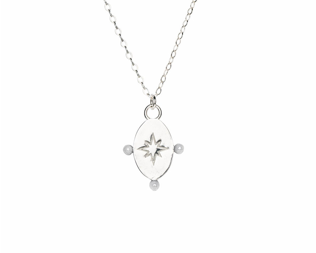 4. Close-up of Morning Star pendant in silver by New Vintage by Kriss, showing star design