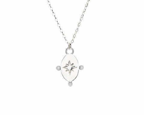 4. Close-up of Morning Star pendant in silver by New Vintage by Kriss, showing star design