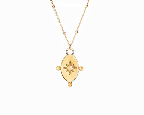 4. Close-up of Morning Star Necklace pendant in gold by New Vintage by Kriss, showing star design detail