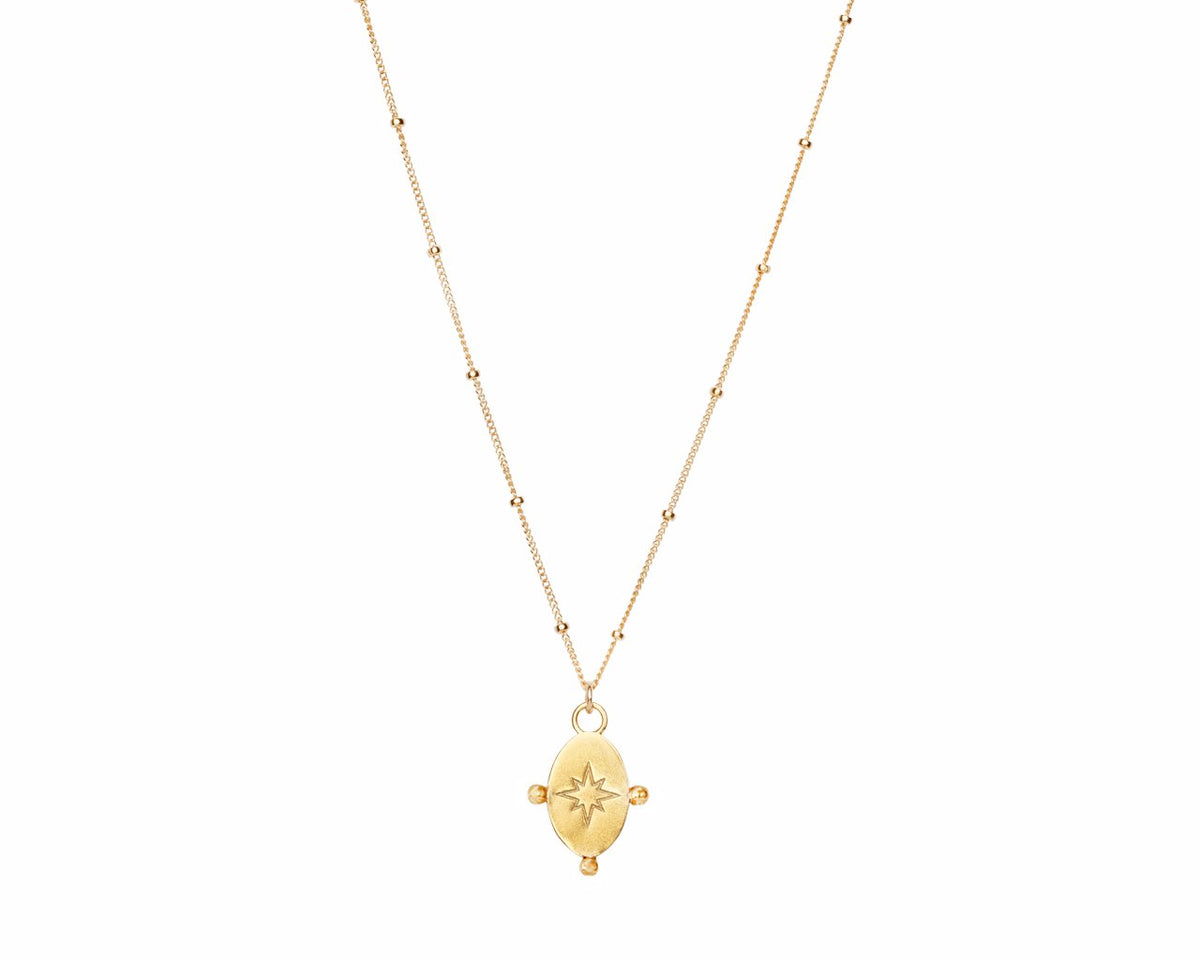3. Studio image of Morning Star Necklace in gold by New Vintage by Kriss, featuring a gold-plated pendant and satellite ball chain