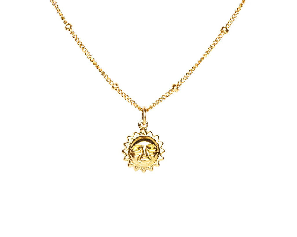 5. Close-up of the Shine Bright Necklace's Sun charm and gold-filled Satellite Ball chain by New Vintage by Kriss