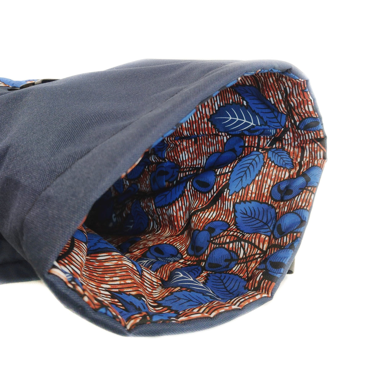 2. Drinbags DARK CHERRY waterproof backpack in black with orange floral front pocket, studio shot