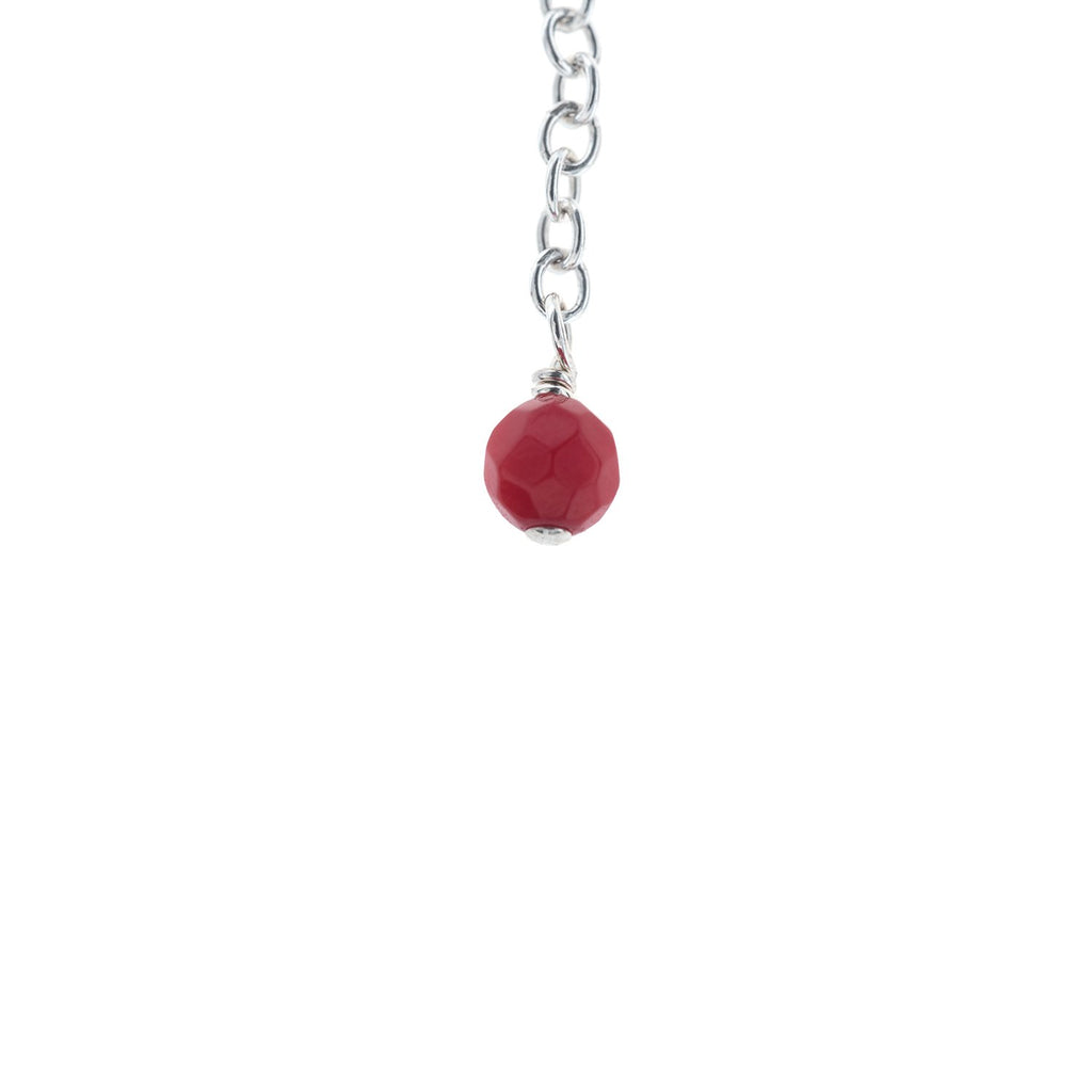 4. Close-up of red coral stone on silver chain from New Vintage by Kriss anklet