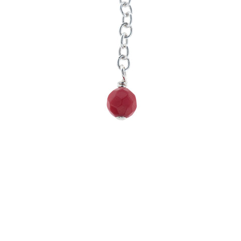 4. Close-up of red coral stone on silver chain from New Vintage by Kriss anklet