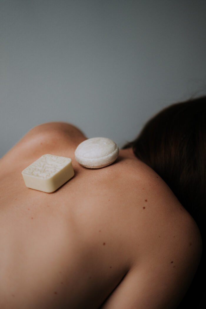 4. Studio shot of V.O.H solid shampoo and conditioner boxes, featuring clean beauty packaging