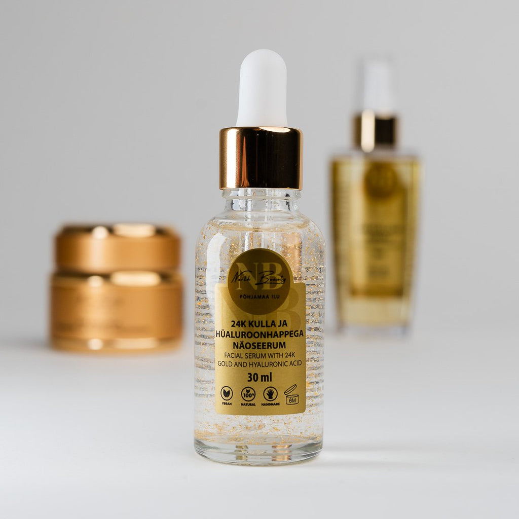 2. North Beauty 24K Gold and Hyaluronic Acid Face Serum, 30ml, with gold-themed skincare products in background