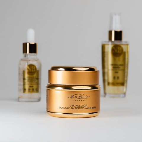 2. North Beauty 24K Gold Restoring and Nourishing Face Cream jar with accompanying skincare products in studio