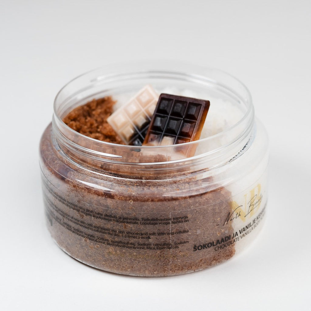 2. Open jar of North Beauty Chocolate and Vanilla Body Scrub with visible chocolate pieces, studio setting