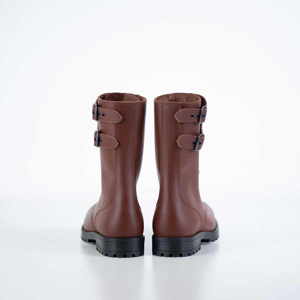 2. Back view of unisex Tarkovsky Boots in light brown leather, showcasing dual buckle detail, studio setting