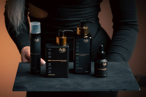 1. North Beauty men's grooming products including face and beard oil, displayed on a tray held by a model