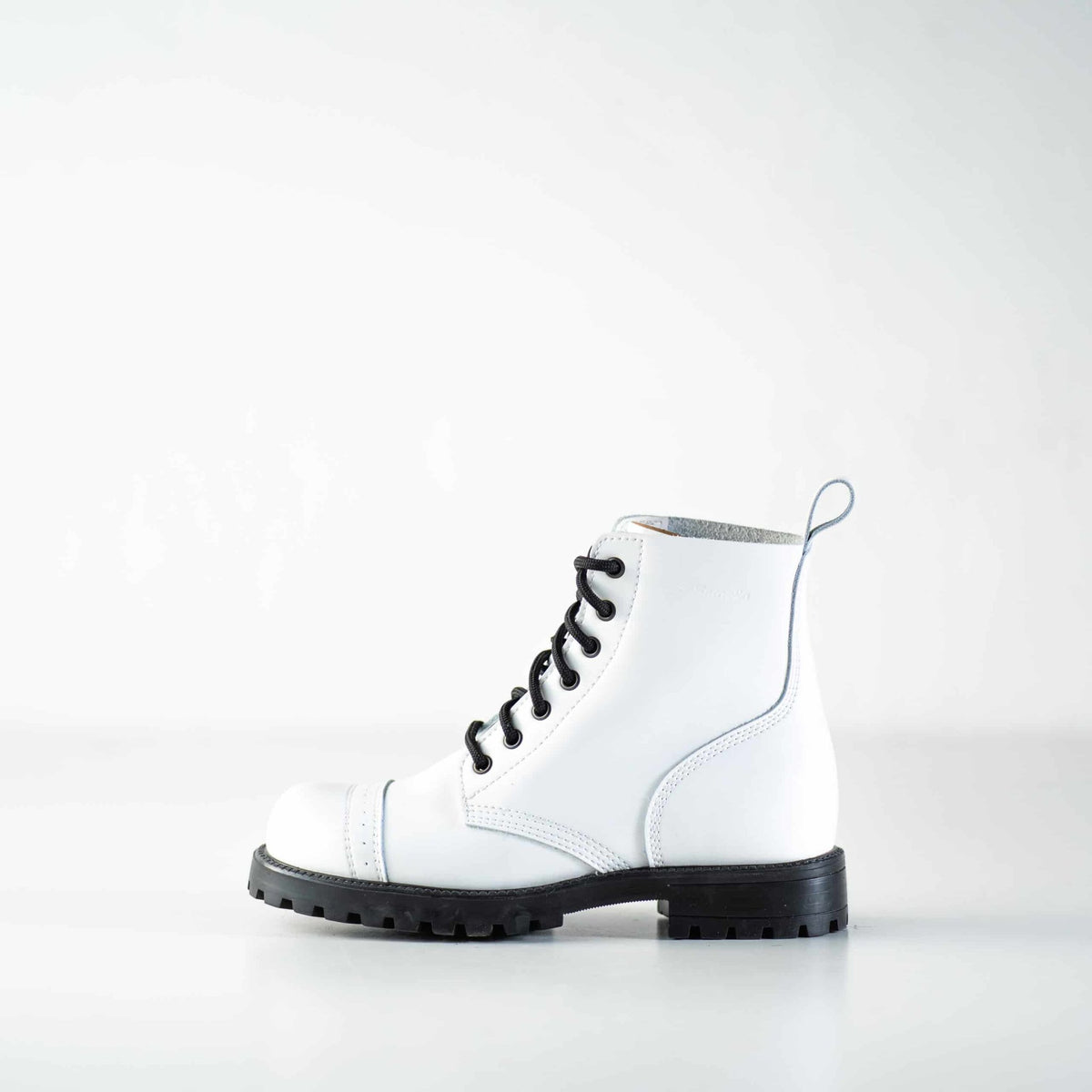 7. Side view of Samelin 517 Aviator Boots in white, featuring black laces and durable sole