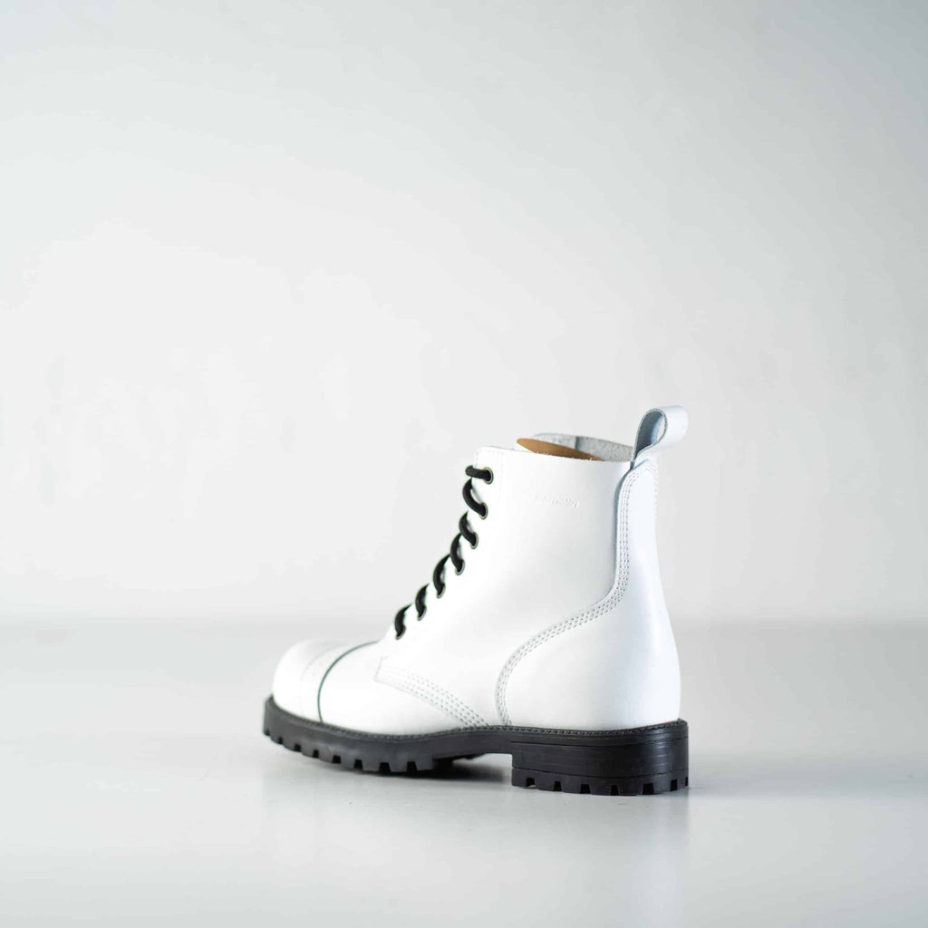 5. Studio image of Samelin 517 Aviator Boots in white, rear view highlighting heel and pull tab