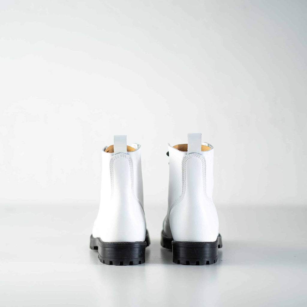 6. Back view of Samelin 517 Aviator Boots in white, showcasing design and black sole
