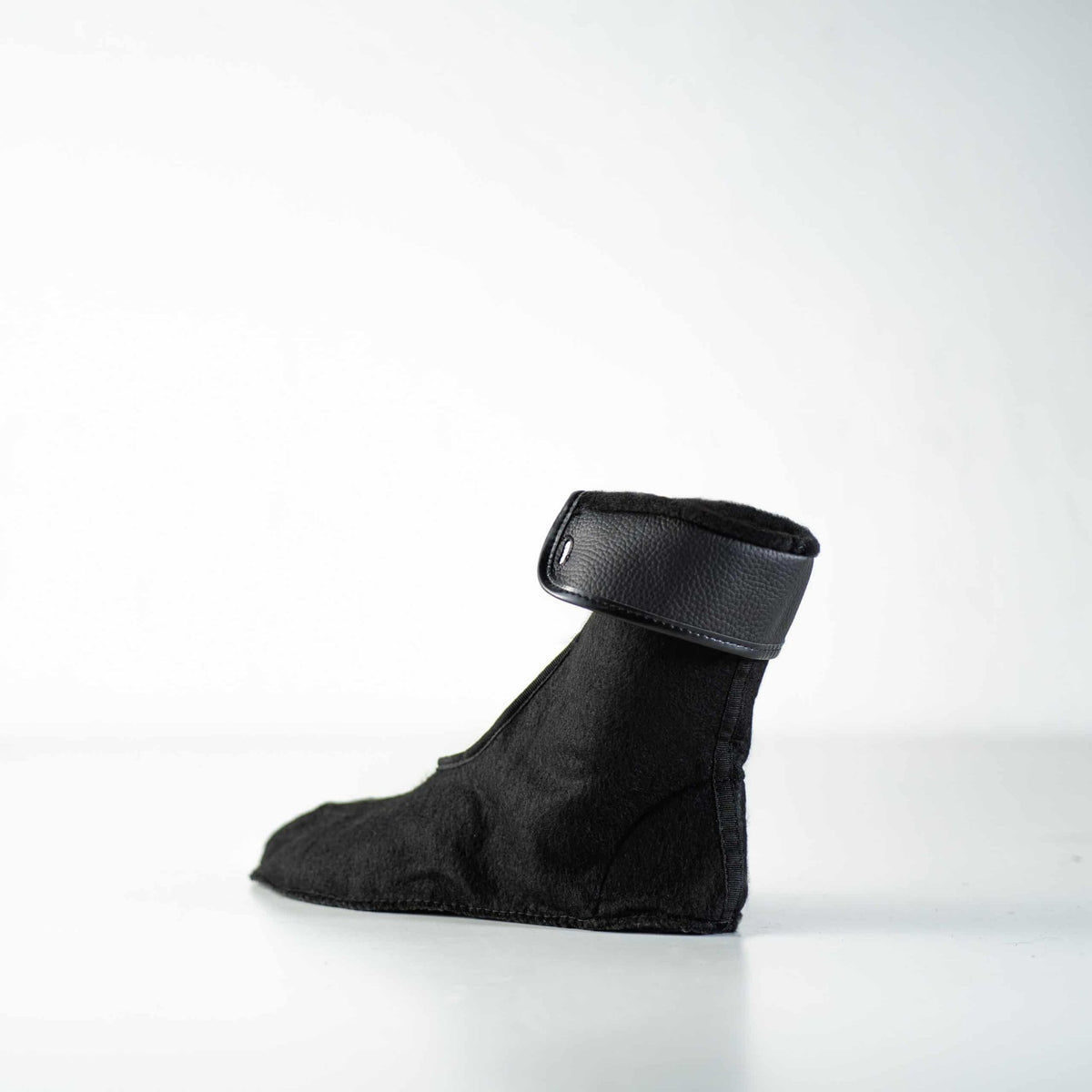 2. Side view of Samelin M77 Inner Socks in black, highlighting durable polyester material, studio shot